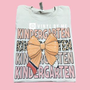 Stacked kindergarten bow tee