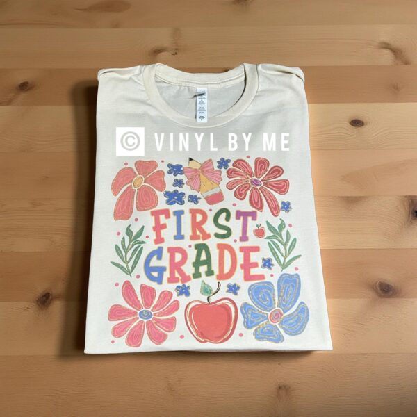 Cream floral first grade tee
