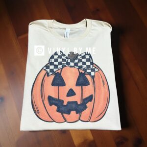 Cream Plaid jack-o’-lantern tee (youth will be slightly darker)