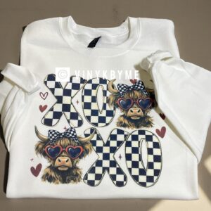 White xoxo cow sweatshirt